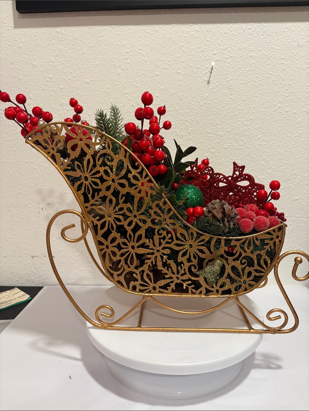 Gold Decorative Holiday Sleigh Centerpiece with Red Accents